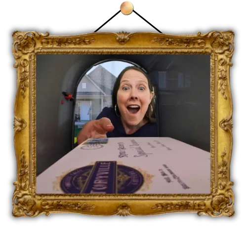 A reader delighted by a Storyville delivery at her mailbox